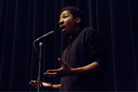 St. Louis Slam Poet XX  performing his poem XX