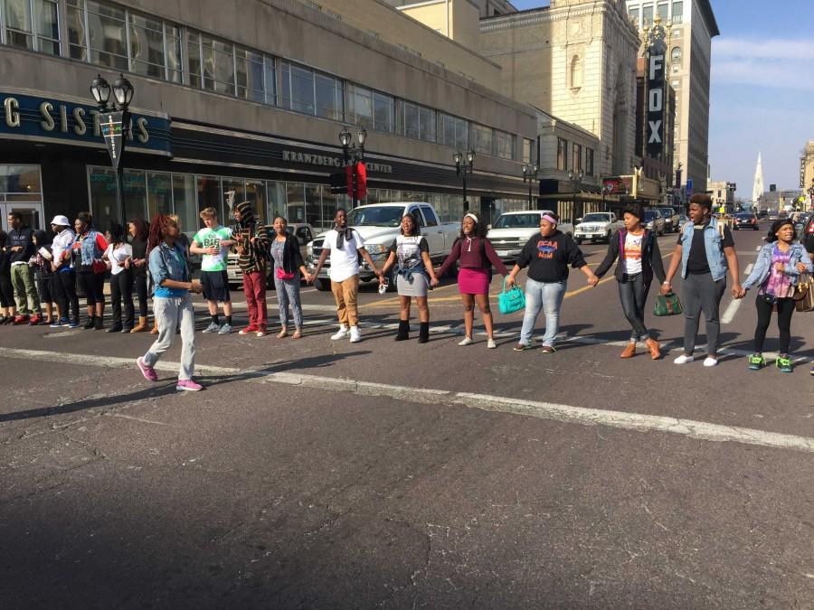 Students protest while blocking Grand on March 12th after the Department of Justice report came out on the Michael Brown case. The protest was to maintain awareness of the Ferguson crisis.   