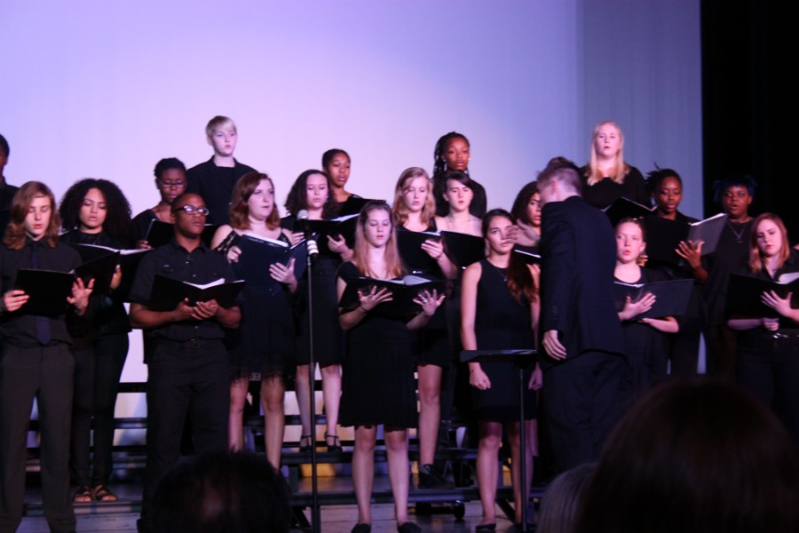 Camerata, directed by Wes Smith, singing “Lacrymosa, from Requiem in d minor” by Wolfgang Amadeus Mozart, “Coming in the Fall” by Jonathan Adams, “Harriet Tubman” by Walter Robinson, arranged by Kathleen McGuire and “Good Night, Dear Heart” by Dan Forrest.