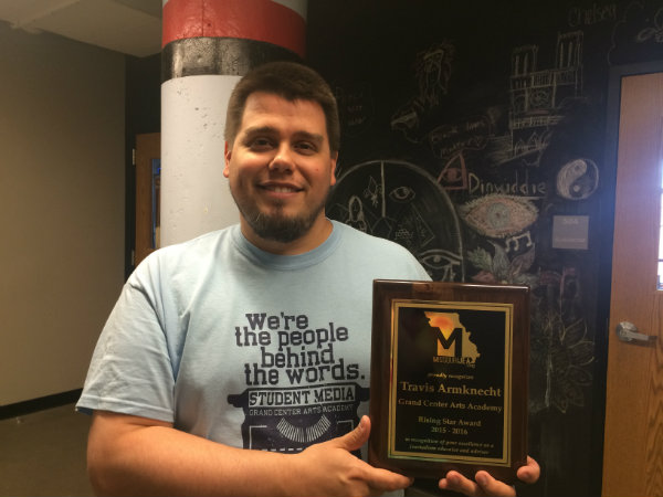 Adviser Travis Armknecht holds MJEA award. Additional information on this can be found at missourijea.org. 