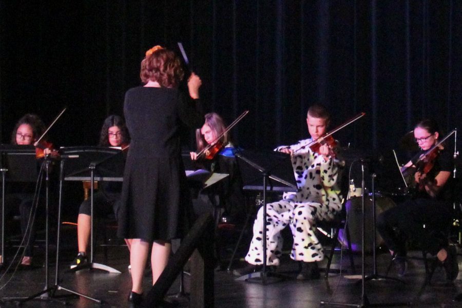 Middle school intermediate orchestra in concert performance.