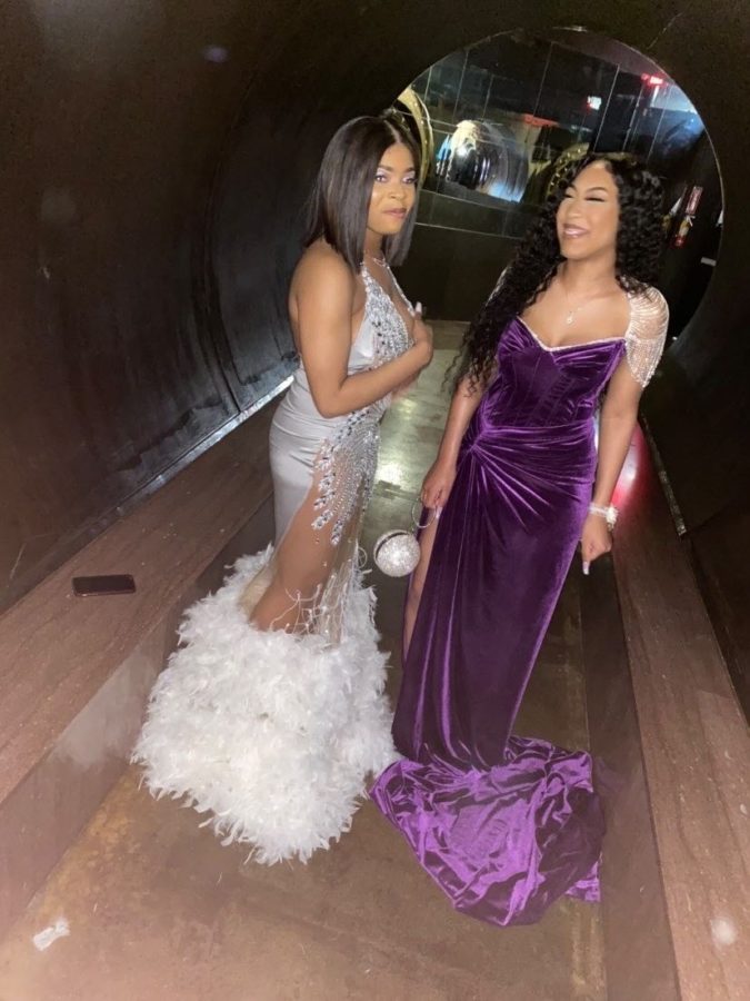“Tamia Swink and Island Lanos pose for a photo inside of the city museum’s vault room hallway”