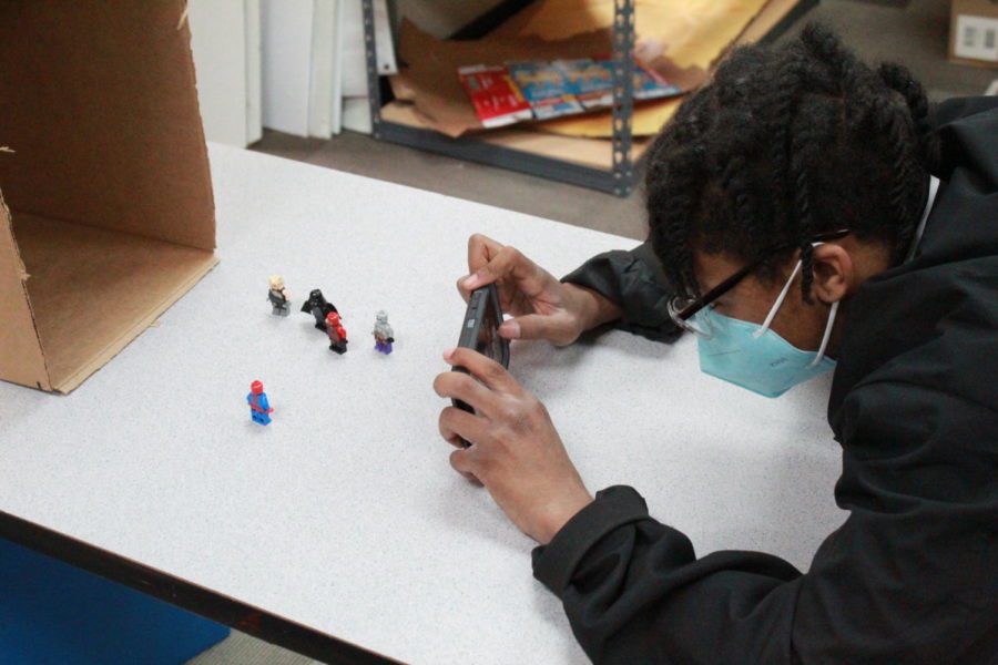 Camren Rankins working on stop motion project.