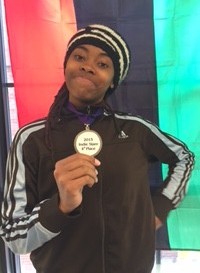 Bisa Adero with her fourth place medal from the Individual Competition