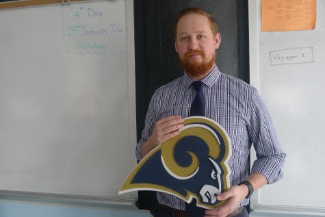 Michael Mancuso, Algebra 1B and 2 instructor, holds Rams' logo in hands. Mancuso tells about his 25 years of experience in St. Louis, and how he is somewhat saddened about the transfer of the Rams. 