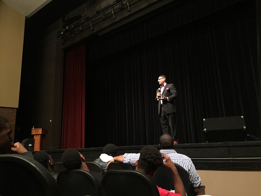 Dr. Steve Perry talks to audience about the system of oppression and how one voice can make a difference