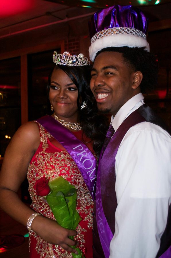 Seniors Amber Frost and Carrington Barnes smile for a picture after being crowned prom queen and king. 