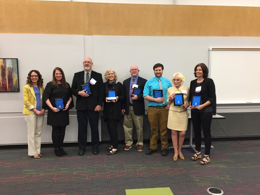 Christine Nobbe (fourth from left) stands with recipients of the Challenger Space Center's Inspiring Teacher Award. This award is given to teachers who encourage their students to go into STEM fields.