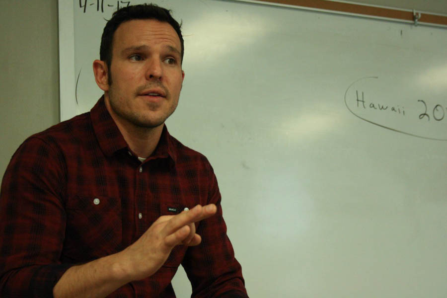 Ben Dinwiddie tells his students about Global Ethos' trip to Hawaii.