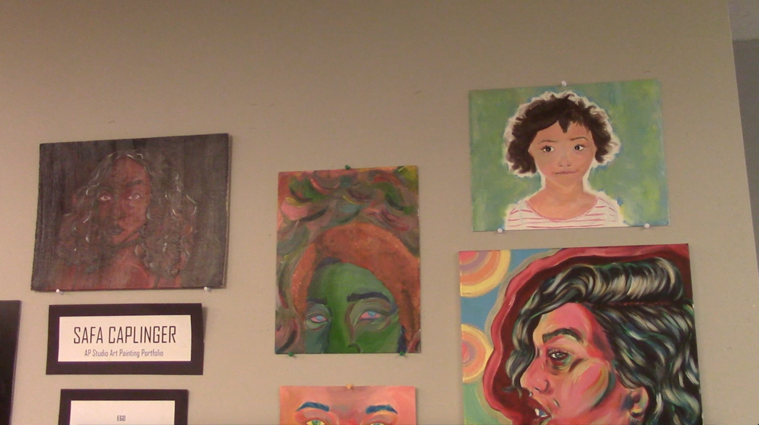 Safa Caplinger created the painted portraits seen in the Sun during the art show on Thursday, April 20th, and then on display in the school lobby. 