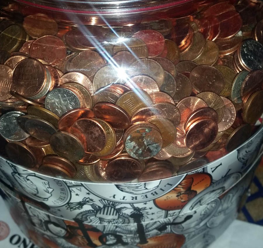 The money jar containing the total amount donated at the end of the Penny War