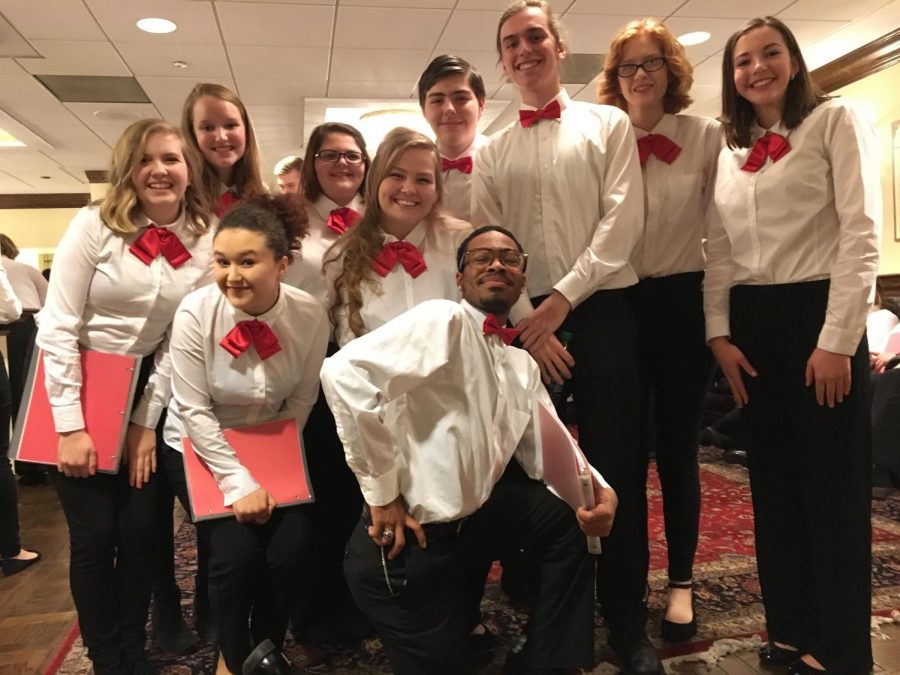 A group of GCAA students pose for a picture in the Whittaker room of Powell Hall. During intermission, singers talked and got to know  others from schools across the St. Louis/Illinois area. 