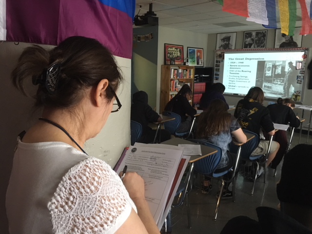 Diana Rudolph middle school teacher, quietly  took notes on high school history teacher, Evan Smiths incorporative teaching style; While students followed along in Smiths lesson taking notes and shouting out opinions. 