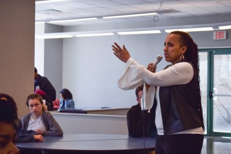 Gina Bell-Moore, High School Principal, speaks to junior and senior classes about the problem of violent threats at school.