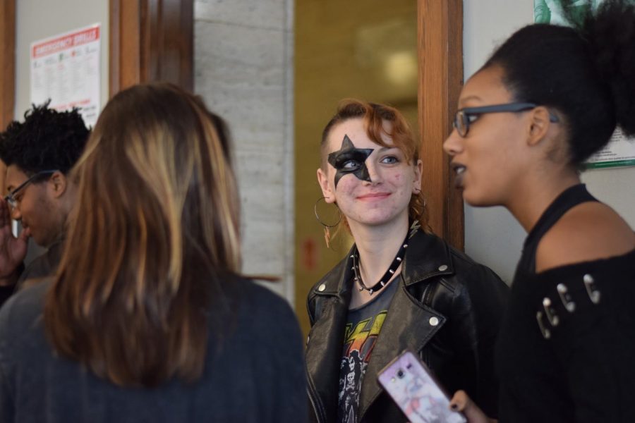 Senior Tess Krampfert, and senior Kali Rogers wait in line for lunch dressed as members of Kiss.
"I've always loved showing my support for the school, and my friends kept up this thing of dressing up every single day," Krampfert said.
