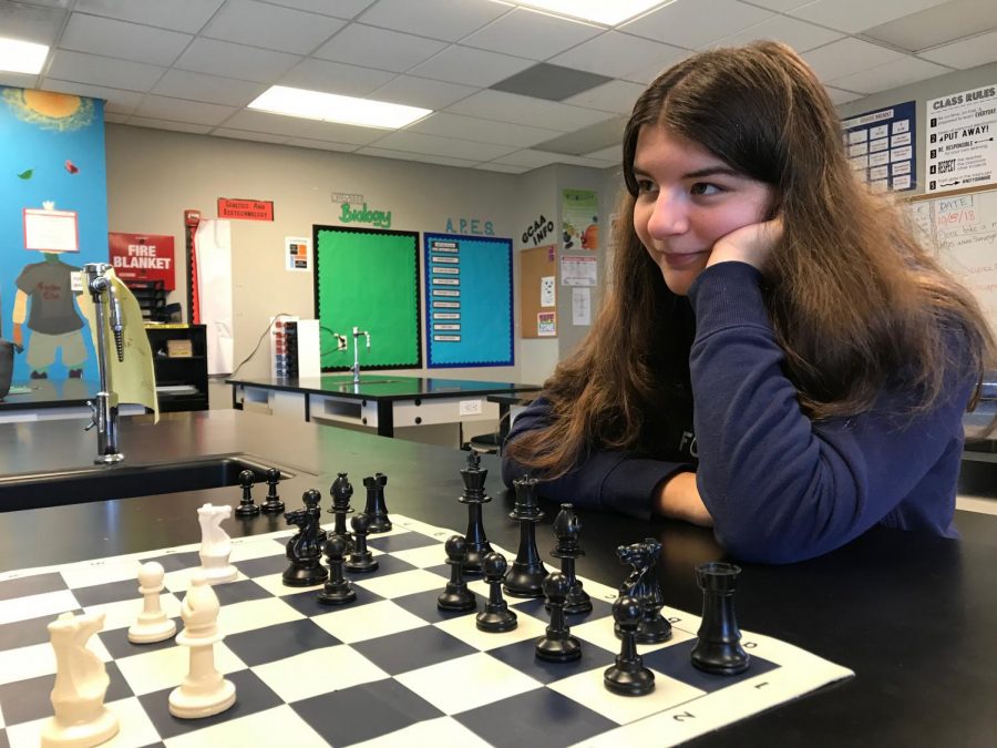 Molly Moen waits for her opponent to make a move.