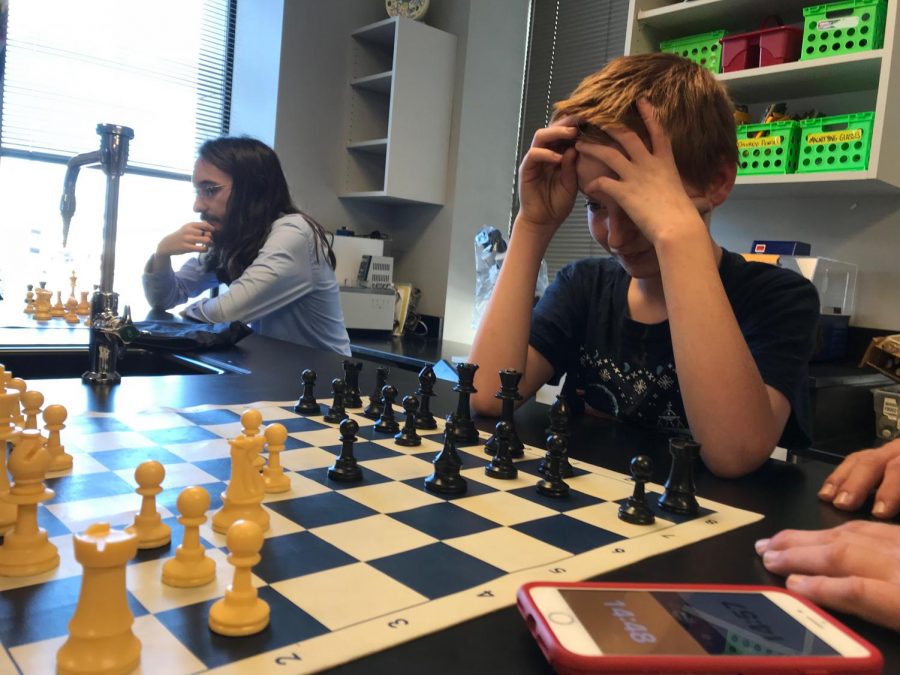 Joseph Miller thinks of his next move in chess.