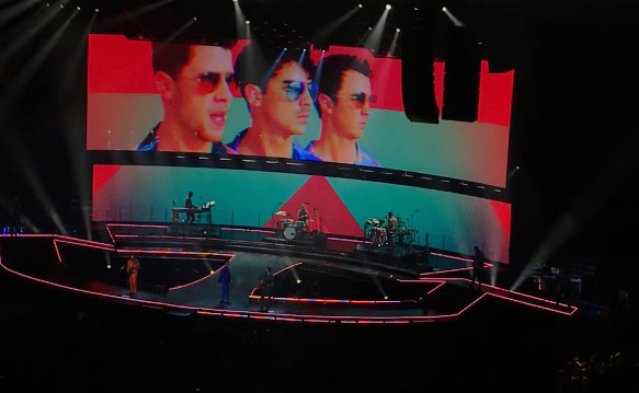 The Jonas Brothers performing their big hit, "Cool" at the Enterprise Center.