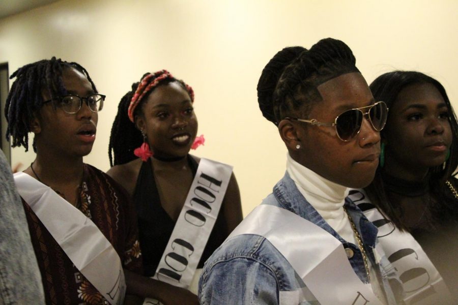 Inline for their introductions, seniors Lizzy Baker, Jardyn Williams, Jermaine Williams, and Nuri Broady, prepare themselves to find out who won Homecoming royalty. With four nominees in each category, a nominee for King walked with a nominee for Queen down an aisle to the DJ stand. "I was really surprised, honestly. I didn't think I'd win 'cause I don't have any friends but I did work really hard and I promoted myself," homecoming queen Nuri Broady said. 