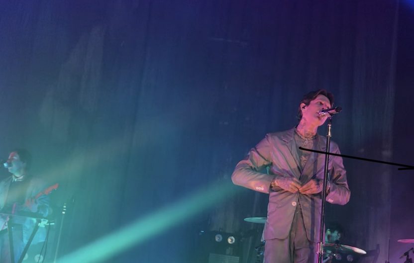 After an off-stage outfit change frontman, Jesse Rutherford, wears an all gray suit. 