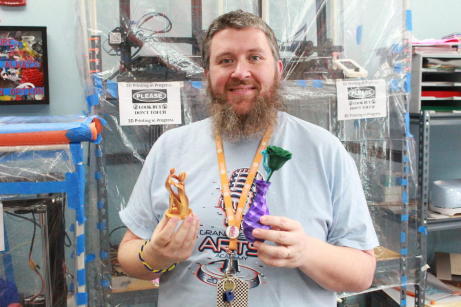 Tim Mulhall getting ready for Mother’s Day. Mulhall created roses with stems and vases to go with them. Mulhall gave these to all the teacher that were mothers.