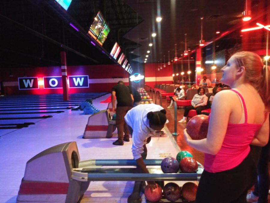 (left) Loren Gill and (right) Natalie Young as the they get ready to bowl